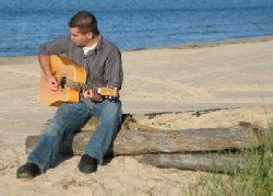 Kevin Bulmer playing guitar